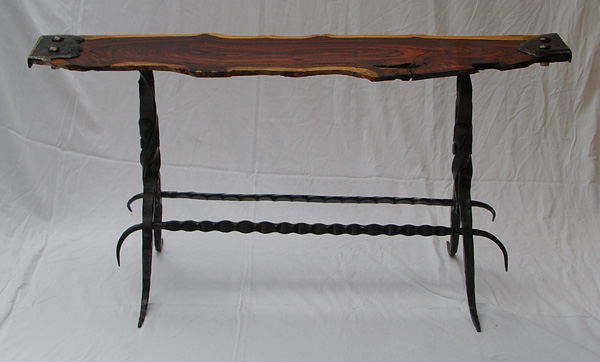 coffee table with wood burl top and forged iron legs