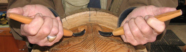 Double edge bent knives are used the same in iether hand.