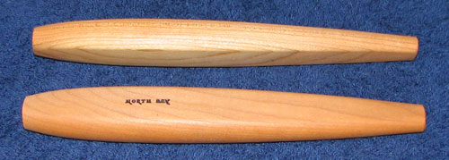 Handles of the bent knives (crooked knives) are widest where they should be