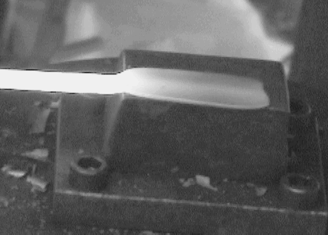 2 MB video clip showing double edge bent knife being forged.